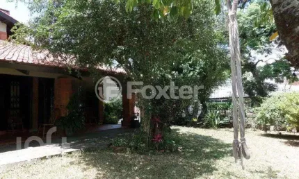 Casa com 4 quartos à venda na Avenida Guaíba, 900, Espírito Santo, Porto Alegre, 365 m2 por R$ 1.300.000