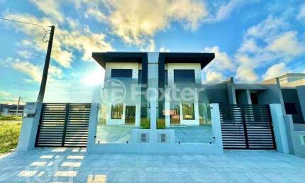Casa com 3 quartos à venda na Rua Flavio Schaeffer, 325, Guarani, Capão da Canoa, 99 m2 por R$ 780.000