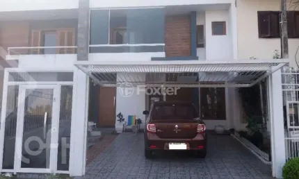 Casa em condomínio fechado com 3 quartos à venda na Rua Carlos Maximiliano Fayet, 210, Hípica, Porto Alegre, 148 m2 por R$ 595.000