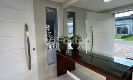 Casa em condomínio fechado com 4 quartos à venda na Rua Honorio Ferreira Da Silva, 2009, Arco Íris, Capão da Canoa, 230 m2 por R$ 1.860.000