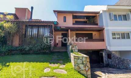Casa em condomínio fechado com 3 quartos à venda na Rua Tocantins, 869, Lomba do Pinheiro, Porto Alegre, 336 m2 por R$ 2.000.000