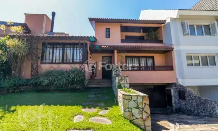Casa em condomínio fechado com 3 quartos à venda na Rua Tocantins, 869, Lomba do Pinheiro, Porto Alegre, 336 m2 por R$ 2.000.000