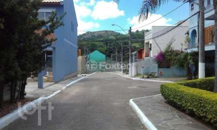 Casa em condomínio fechado com 2 quartos à venda na Rua Alcebíades Ribeiro, 65, Aberta dos Morros, Porto Alegre, 60 m2 por R$ 290.000