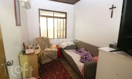 Casa com 3 quartos à venda na Avenida São Sebastião, 197, Nonoai, Porto Alegre, 200 m2 por R$ 490.000