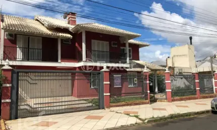 Casa com 5 quartos à venda na Rua Fermino Correa da Gama, 381, Vila Monte Carlo, Cachoeirinha, 440 m2 por R$ 1.400.000