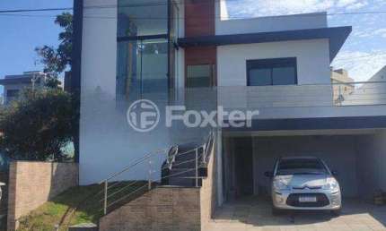 Casa em condomínio fechado com 3 quartos à venda na Rua Lino Estácio dos Santos, 1001, Oriço, Gravataí, 142 m2 por R$ 1.090.000