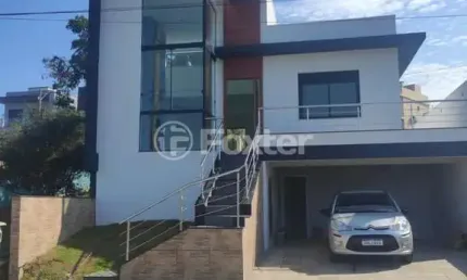Casa em condomínio fechado com 3 quartos à venda na rua lino estácio dos santos, 1001, oriço, gravataí, 142 m2 por r$ 1.090.000
