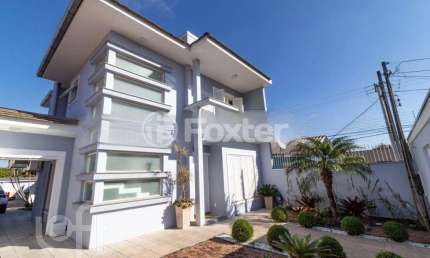 Casa com 3 quartos à venda na Rua Santa Cruz, 967, Niterói, Canoas, 123 m2 por R$ 1.150.000