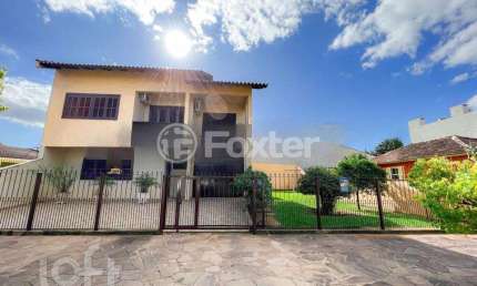 Casa com 3 quartos à venda na Rua João Aluysio Jacob, 381, Fátima, Canoas, 200 m2 por R$ 850.000