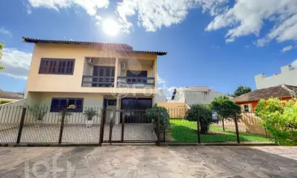 Casa com 3 quartos à venda na Rua João Aluysio Jacob, 381, Fátima, Canoas, 200 m2 por R$ 850.000