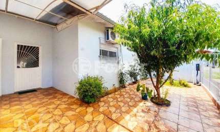 Casa com 3 quartos à venda na Rua das Orquídeas, 48, Harmonia, Canoas, 98 m2 por R$ 575.000