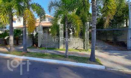 Casa com 5 quartos à venda na Rua País de Gales, 41, Marechal Rondon, Canoas, 333 m2 por R$ 2.500.000