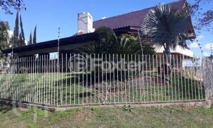 Casa com 3 quartos à venda na Rua Irmão João Maria, 34, Marechal Rondon, Canoas, 397 m2 por R$ 4.190.000