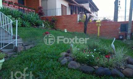Casa com 3 quartos à venda na Rua Teotônia, 35, Camaquã, Porto Alegre, 220 m2 por R$ 1.400.000
