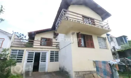 Casa com 5 quartos à venda na Rua Samuel Madureira Coelho, 22, Teresópolis, Porto Alegre, 280 m2 por R$ 700.000