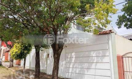 Casa com 4 quartos à venda na Rua Querubim Costa, 187, Coronel Aparício Borges, Porto Alegre, 258 m2 por R$ 820.000