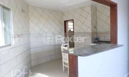 Casa com 3 quartos à venda na Rua Ângelo Passuelo, 220, Vila Nova, Porto Alegre, 320 m2 por R$ 651.000