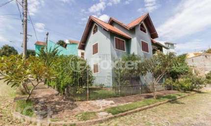 Casa com 4 quartos à venda na Rua Inês Vinhas, 40, Espírito Santo, Porto Alegre, 220 m2 por R$ 990.000