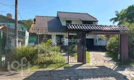Casa com 3 quartos à venda na Rua Mura, 60, Guarujá, Porto Alegre, 157 m2 por R$ 690.000