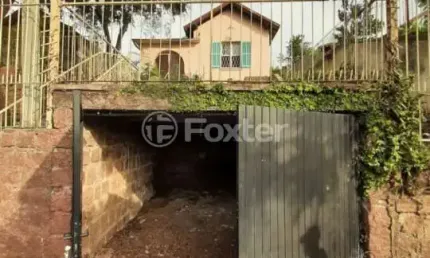 Casa com 4 quartos à venda na Avenida Felipe Weimann, 98, Santa Tereza, Porto Alegre, 180 m2 por R$ 348.000