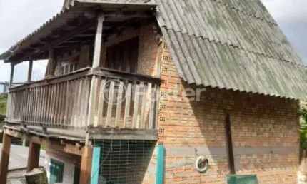 Casa com 3 quartos à venda na Rua Costa Lima, 657, Nonoai, Porto Alegre, 130 m2 por R$ 300.000