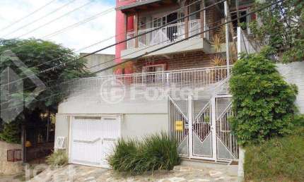 Casa com 3 quartos à venda na Rua Antônio João Brugnera, 123, Santa Tereza, Porto Alegre, 110 m2 por R$ 600.000