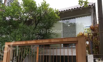 Casa com 3 quartos à venda na rua taveira júnior, 30, nonoai, porto alegre, 305 m2 por r$ 1.060.000