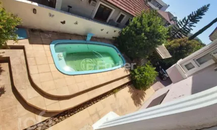 Casa com 3 quartos à venda na rua engenheiro coelho parreira, 302, ipanema, porto alegre, 292 m2 por r$ 1.150.000