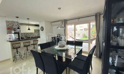 Casa com 3 quartos à venda na Rua Roberto Santini, 224, Hípica, Porto Alegre, 125 m2 por R$ 660.000
