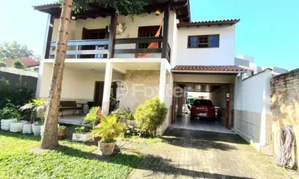 Casa com 5 quartos à venda na avenida coronel marcos, 2124, pedra redonda, porto alegre, 150 m2 por r$ 1.300.000