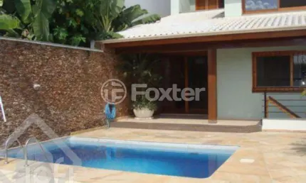 Casa com 5 quartos à venda na Rua Doutor Mário Totta, 1790, Tristeza, Porto Alegre, 814 m2 por R$ 1.700.000