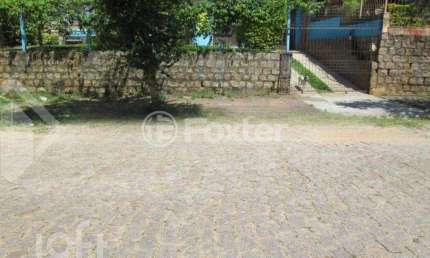 Casa com 5 quartos à venda na Rua Carlos Ferreira, 182, Teresópolis, Porto Alegre, 115 m2 por R$ 529.000