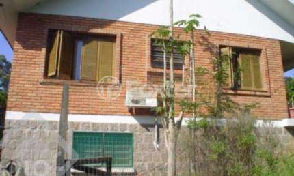 Casa com 3 quartos à venda na Estrada Kanazawa, 84, Vila Nova, Porto Alegre, 300 m2 por R$ 700.000
