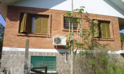 Casa com 3 quartos à venda na Estrada Kanazawa, 84, Vila Nova, Porto Alegre, 300 m2 por R$ 700.000