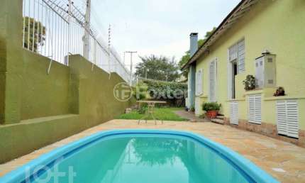 Casa com 3 quartos à venda na Rua Júlio Lopes dos Santos Sobrinho, 175, Santa Tereza, Porto Alegre, 142 m2 por R$ 590.000
