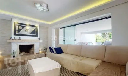 Casa com 4 quartos à venda na rua jacundá, 132, guarujá, porto alegre, 240 m2 por r$ 1.700.000