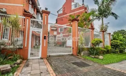 Casa em condomínio fechado com 3 quartos à venda na avenida guaíba, 4400, vila assunção, porto alegre, 248 m2 por r$ 950.000