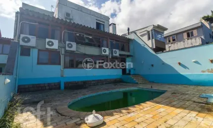 Casa com 3 quartos à venda na Rua Caeté, 1040, Vila Assunção, Porto Alegre, 678 m2 por R$ 1.700.000