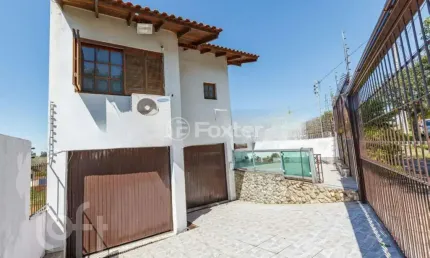 Casa com 4 quartos à venda na Avenida Edu Las-Casas, 565, Parque Santa Fé, Porto Alegre, 237 m2 por R$ 649.000