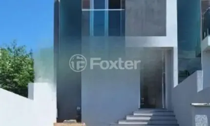 Casa em condomínio fechado com 3 quartos à venda na Rua Ana Abruzzi, 130, Mário Quintana, Porto Alegre, 110 m2 por R$ 599.099
