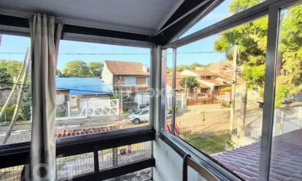 Casa com 6 quartos à venda na Rua Fábio de Barros, 388, Nonoai, Porto Alegre, 294 m2 por R$ 693.000