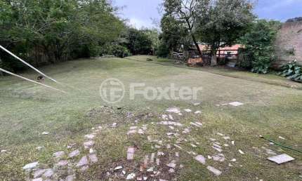 Casa com 2 quartos à venda na Rua Adalberto Garcia, 431, Hípica, Porto Alegre, 56 m2 por R$ 550.000