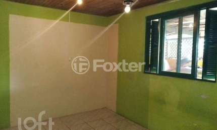 Casa com 3 quartos à venda na Quadra A Quatro B, 33, Guajuviras, Canoas, 284 m2 por R$ 420.000