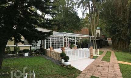 Casa com 3 quartos à venda na Estrada Joaquim Teixeira de Souza, 275, Parque Itacolomi, Gravataí, 1000 m2 por R$ 620.000