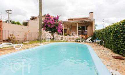 Casa com 3 quartos à venda na Rua César de Castro, 163, Teresópolis, Porto Alegre, 249 m2 por R$ 780.000