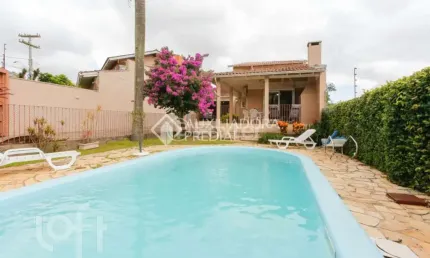 Casa com 3 quartos à venda na Rua César de Castro, 163, Teresópolis, Porto Alegre, 249 m2 por R$ 780.000