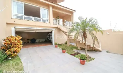 Casa com 3 quartos à venda na rua joaquim cruz, 521, santo antônio, porto alegre, 316 m2 por r$ 1.149.000