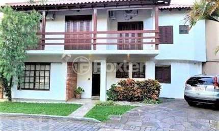 Casa em condomínio fechado com 3 quartos à venda na Rua Conrado Ferrari, 71, Jardim Isabel, Porto Alegre, 211 m2 por R$ 800.000