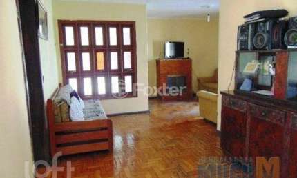 Casa com 3 quartos à venda na Rua General Salustiano, 643, Marechal Rondon, Canoas, 390 m2 por R$ 1.200.000