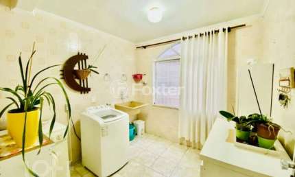 Casa com 4 quartos à venda na Rua Santo André, 86, Marechal Rondon, Canoas, 208 m2 por R$ 1.050.000